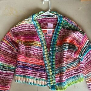 Woman’s “wild fable” Sweater